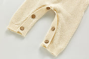 Knitted baby jumpsuit with buttons