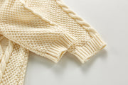 Knitted baby jumpsuit with buttons