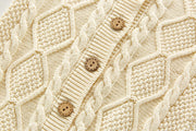 Knitted baby jumpsuit with buttons