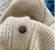 Knitted baby cardigan with hood and buttons