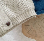 Knitted baby cardigan with hood and buttons