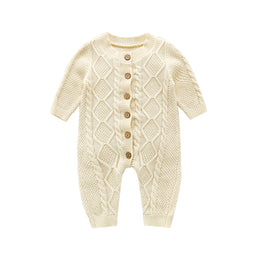 Stickad babyjumpsuit med knappar